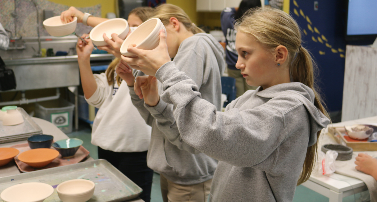Photo of Lighthouse students in ceramics class